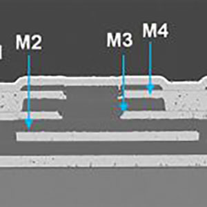x-SEMs of ECM interposer showing TSV contact point (left) and frontside metal stack (right); TSVs are unfilled (barrel coated)